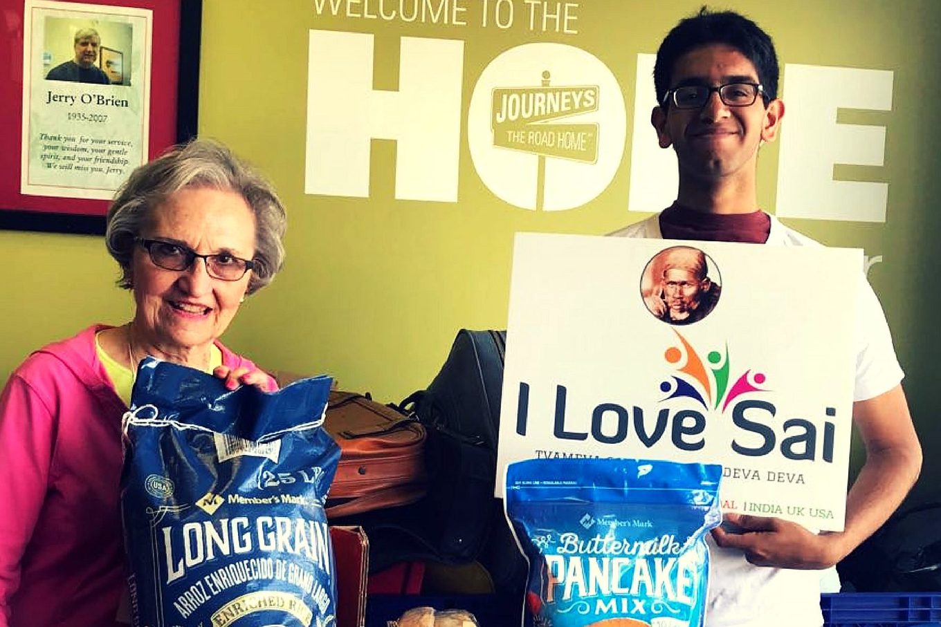 Volunteers with donated rice and pancake mix at the HOPE Center