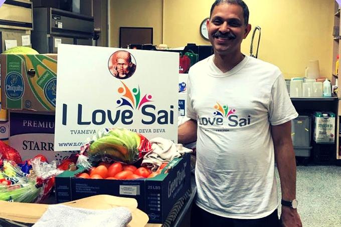 A volunteer with fresh produce at The Hoboken Shelter