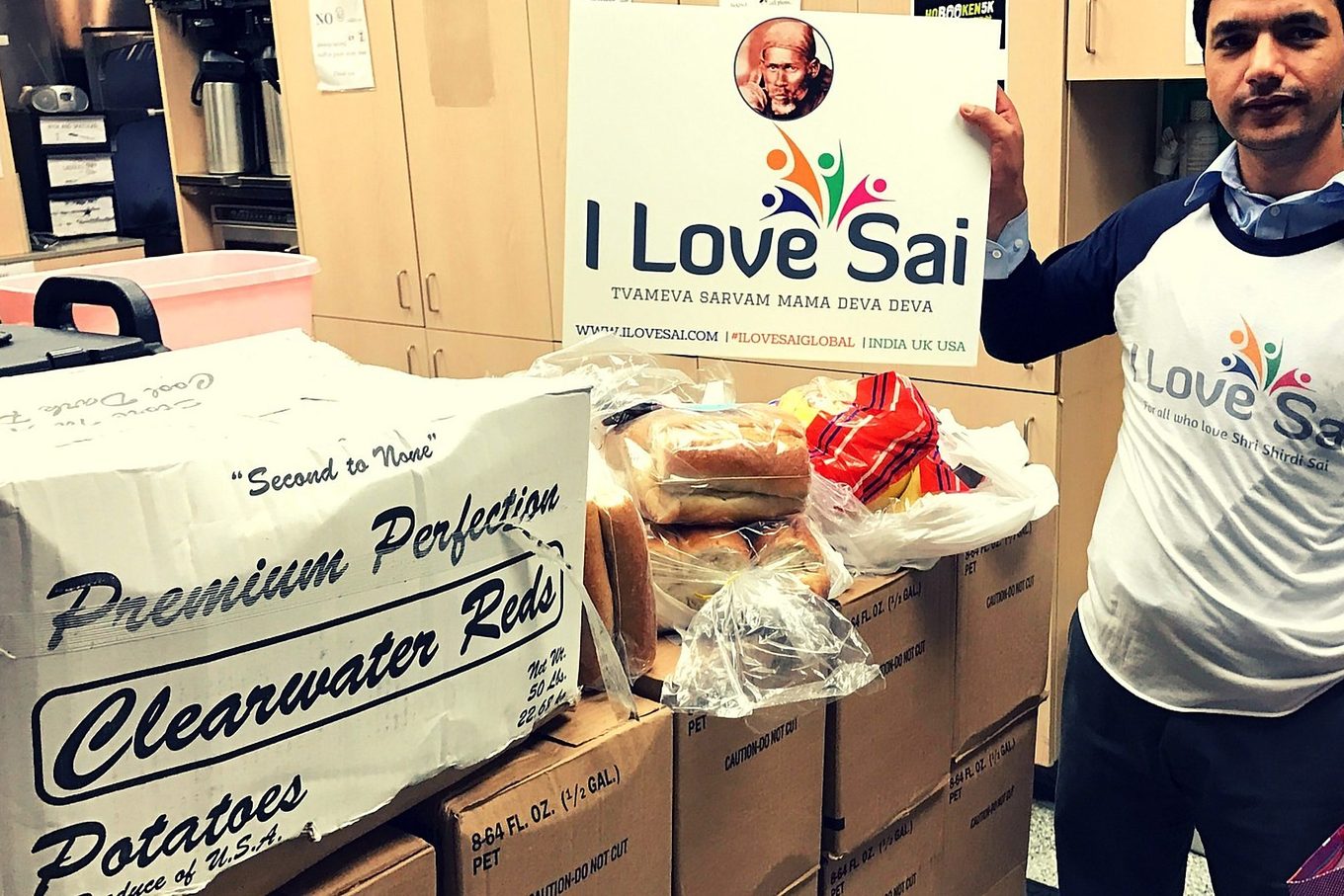 A volunteer with donated bread at The Hoboken Shelter